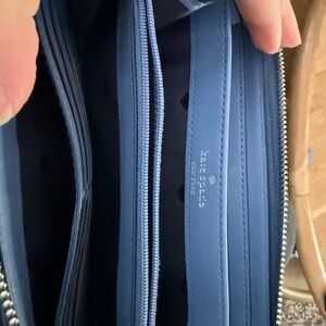 kate spade navy blue zip-around leather wallet